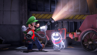 Luigi inside a garage in the Basement with Polterpup after completing the tutorial