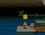 Mario next to the Shine Sprite above the sea on the east of Rogueport Sewers