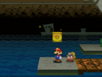 Mario next to the Shine Sprite above the sea on the east of Rogueport Sewers in Paper Mario: The Thousand-Year Door.