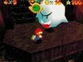 An early screenshot of Mario on Big Boo's balcony, showing different textures.