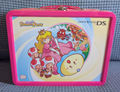 A Nintendo DS carrying tin, themed on Super Princess Peach.