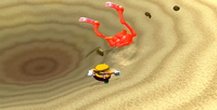 The Sandworm in Wario World prepares to attack