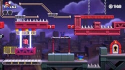 Screenshot of Twilight City level 8-4 from the Nintendo Switch version of Mario vs. Donkey Kong