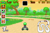 Luigi racing at Donut Plains 1 in Mario Kart: Super Circuit.