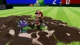 Mario covered in mud from the effects of the Mud Racket