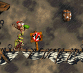 The Kongs lead Rattly into a "No Rattly" sign in Topsail Trouble of Donkey Kong Country 2: Diddy's Kong Quest