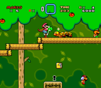 A Wiggler in the Forest of Illusion 1 stage from Super Mario World. A keyhole is below Mario and Yoshi.