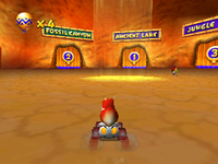 Conker drives in the Dino Domain lobby in Diddy Kong Racing.