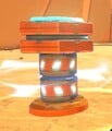 A Spin Boost Pillar on 3DS Rock Rock Mountain, using the design from Battle Stadium's Spin Boost Pillars.