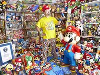 Brett Martin, former holder of the Guinness World Record for most videogame memorabilia, pictured with his collection of Mario merchandise