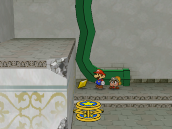 Mario getting the Star Piece near the pipe in the room to the right of the thousand year door in Paper Mario: The Thousand-Year Door.