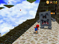 Mario encounters a Whomp in Super Mario 64 DS.