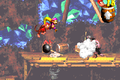 The Kongs jump over a kannonball shot by a Kannon, shortly before the Star Barrel