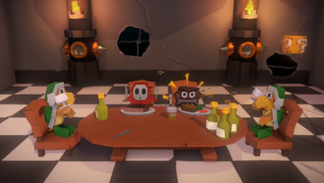 An alternate view of the Folded Soldiers feasting in the mess hall of Bowser's Castle in Paper Mario: The Origami King