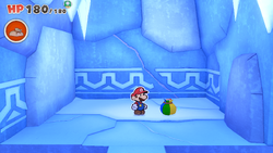 Mario standing near a Small Bag of Confetti in Sea Tower of The Origami King.