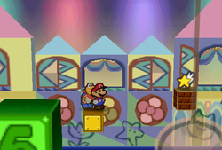 Mario finding Shooting Star atop a brick block in Shy Guy's Toy Box of Paper Mario.