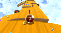 Mario on the wooden planet of Rolling Masterpiece Galaxy in Super Mario Galaxy 2