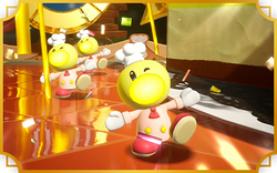 Three bakers in Welcome to the Festival of Sweets who celebrate that Peach has just successfully decorated a cake. The angle of the screenshot is impossible to do in the game, and was likely set up by the game's developers for use on Nintendo of Japan's websites for Princess Peach: Showtime!