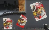 Screenshot from Super Mario Odyssey, showing three variations of Wedding announcement posters in the Cap Kingdom (during To the Top of Top-Hat Tower)