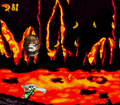 The Kongs are inside a Steerable Barrel, hovering above a green Kutlass