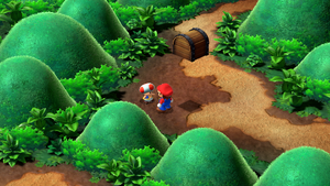 Toad giving Mario a Honey Syrup in the Mushroom Way of Super Mario RPG.