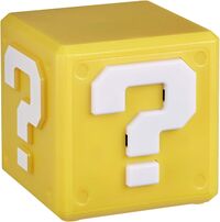 The ? Block included in Monopoly: Super Mario Celebration!