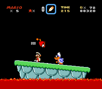 A screenshot of Mario sliding into Iggy's rolling balls, displaying a glitched sprite.