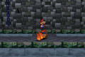 Mario jumping over the Fire Bar