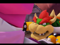 Bowser about to notice Mario during his duel with Bedrock