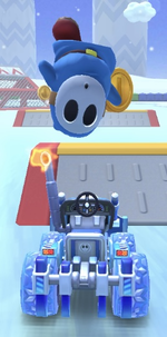 Light-blue Shy Guy performing a trick.