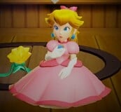 Peach sitting down in Sparkle form after losing all of her health