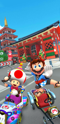 The splash screen of the New Year's Tour from Mario Kart Tour