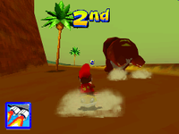 Diddy Kong races Tricky in his course in Diddy Kong Racing DS.
