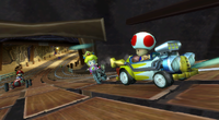 Toad racing in the mines portion of Wario's Gold Mine in Mario Kart Wii.
