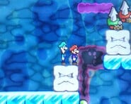 An Ice block (left) and a Bone Thwomp (right) after being pushed on the ice in Mario & Luigi: Bowser's Inside Story.