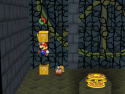 Screenshot of Mario revealing a hidden ? Block (containing a Point Swap) in the Palace of Shadow, in Paper Mario: The Thousand-Year Door.