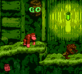 Donkey Kong walking to a Stop and Go Barrel