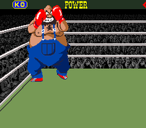 Screenshot of the arcade version of Super Punch-Out!!, showing Mario, Luigi, Donkey Kong, and Donkey Kong Jr. in the audience