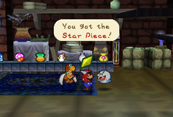 Mario getting a Star Piece from Igor in Paper Mario
