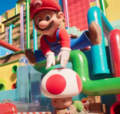 Mario vaulting over Toad in The Super Mario Bros. Movie McDonald's television ad
