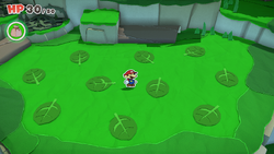 Mario standing in the memory leaf game in Whispering Woods of The Origami King.