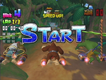 A race starts in the jungle stage of the E3 2006 Nintendo GameCube title, DK Bongo Blast.