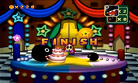 A rare case of the small Chain Chomp winning the Game Guy's Sweet Surprise minigame in Mario Party 3