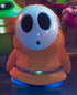 An orange Shy Guy, as seen in The Super Mario Galaxy Movie