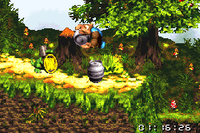 Kiddy Kong about to throw a Steel Barrel behind Koin in the Game Boy Advance remake of Donkey Kong Country 3