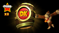 Donkey Kong hitting a Slot Machine Barrel when the DK logo is displayed