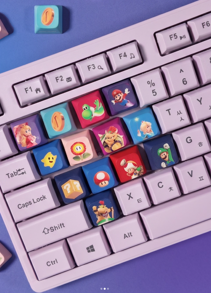 File:TSMGM GS25 Promotional Keycaps.png