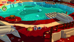 Mario standing near a bush containing a Small Bag of Confetti in Autumn Mountain of The Origami King.