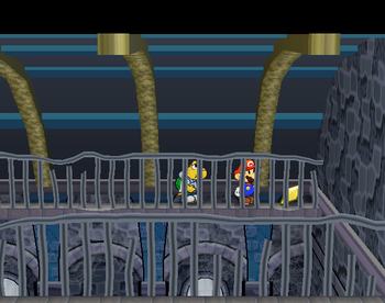 Mario getting the Star Piece in the upper-north-east corner of the yellow block room in Hooktail Castle in Paper Mario: The Thousand-Year Door.