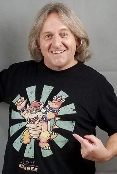Kenny James wearing a Bowser shirt